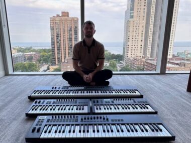 Chris Senner With His MIDI Controller Collection